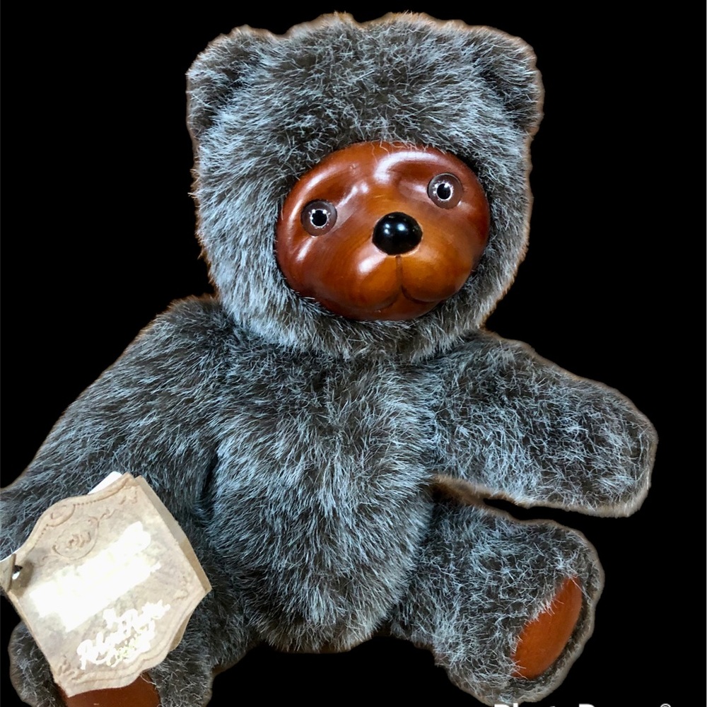 Raikes bear with carved wooden face